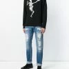 Alexander McQueen distressed folk embroidery jeans