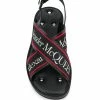 Alexander McQueen cross strap sandals