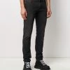 Alexander McQueen dragon patch slim-fit jeans