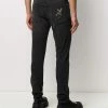 Alexander McQueen dragon patch slim-fit jeans