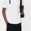 Alexander McQueen logo-strap pique polo shirt