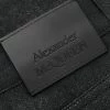 Alexander McQueen logo patch denim jeans