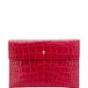 Alexander McQueen crocodile-effect skull clutch bag