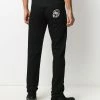 Alexander McQueen logo patch slim-fit jeans