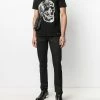 Alexander McQueen Logo studded slim fit jeans 8 Alexander McQueen logo-studded slim-fit jeans