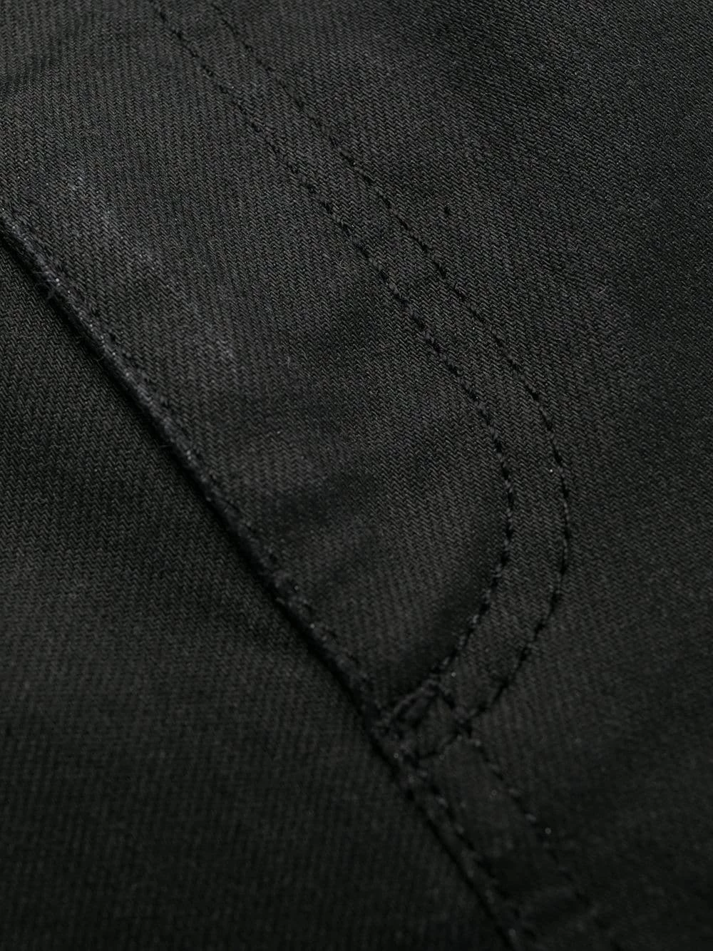 Alexander McQueen Logo studded slim fit jeans 6 Alexander McQueen logo-studded slim-fit jeans