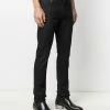 Alexander McQueen Logo studded slim fit jeans 9 Alexander McQueen logo-studded slim-fit jeans