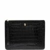 Alexander McQueen skull charm leather clutch bag