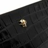Alexander McQueen skull charm leather clutch bag
