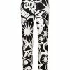 Alexander McQueen all-over print slim-fit trousers