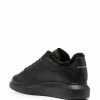 Alexander McQueen Oversized shearling-trim sneakers