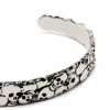 Alexander McQueen skull-engraved cuff bracelet