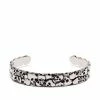 Alexander McQueen skull-engraved cuff bracelet