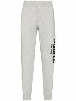 Alexander McQueen graffiti-print track pants