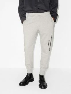 Alexander McQueen graffiti-print track pants