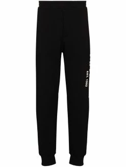 Alexander McQueen logo graffiti print track pants