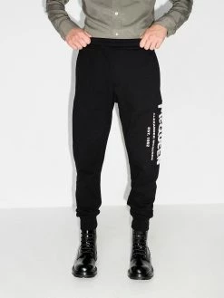 Alexander McQueen logo graffiti print track pants