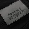 Alexander McQueen logo-patch slim-cut trousers