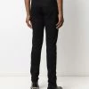 Alexander McQueen logo-patch slim-cut trousers