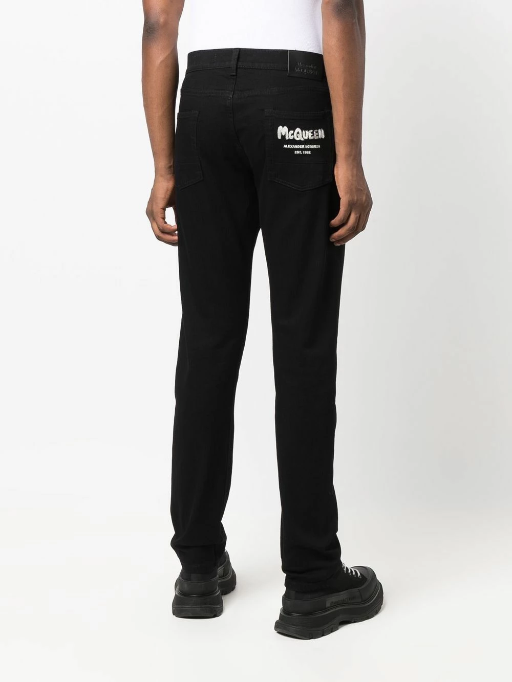 Alexander McQueen Logo print slim cut jeans 4 Alexander McQueen logo-print slim-cut jeans