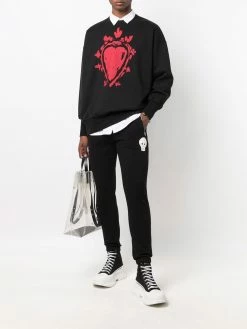 Alexander McQueen crochet-design track pants