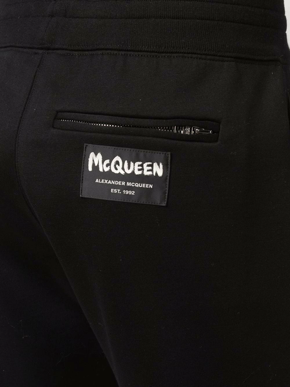 Alexander McQueen Tapered logo patch track pants 5 Alexander McQueen tapered logo-patch track pants