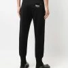 Alexander McQueen Tapered logo patch track pants 10 Alexander McQueen tapered logo-patch track pants