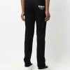 Alexander McQueen Logo embroidered skinny jeans 10 Alexander McQueen logo-embroidered skinny jeans