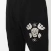 Alexander McQueen skull-motif track pants