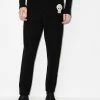 Alexander McQueen skull-embroidered zip-ankle tack pants