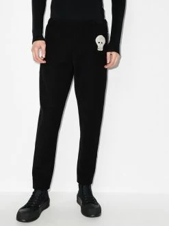 Alexander McQueen skull-embroidered zip-ankle tack pants