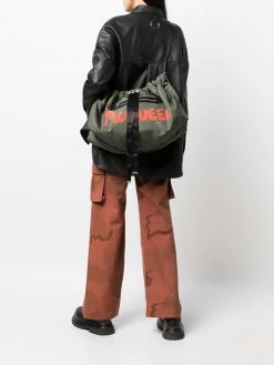 Alexander McQueen logo-print drawstring-fastening crossbody bag