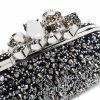 Alexander McQueen Four ring skull studded clutch 8 Alexander McQueen four-ring skull studded clutch