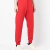 Alexander McQueen Side logo print trousers 9 Alexander McQueen side logo-print trousers