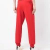 Alexander McQueen Side logo print trousers 10 Alexander McQueen side logo-print trousers