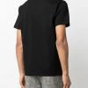Alexander McQueen Skull studded cotton T shirt 8 Alexander McQueen skull-studded cotton T-shirt